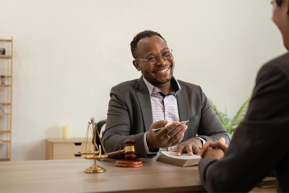 business-team-and-lawyers-discussing-contract-pape-XV6QZBN.jpg